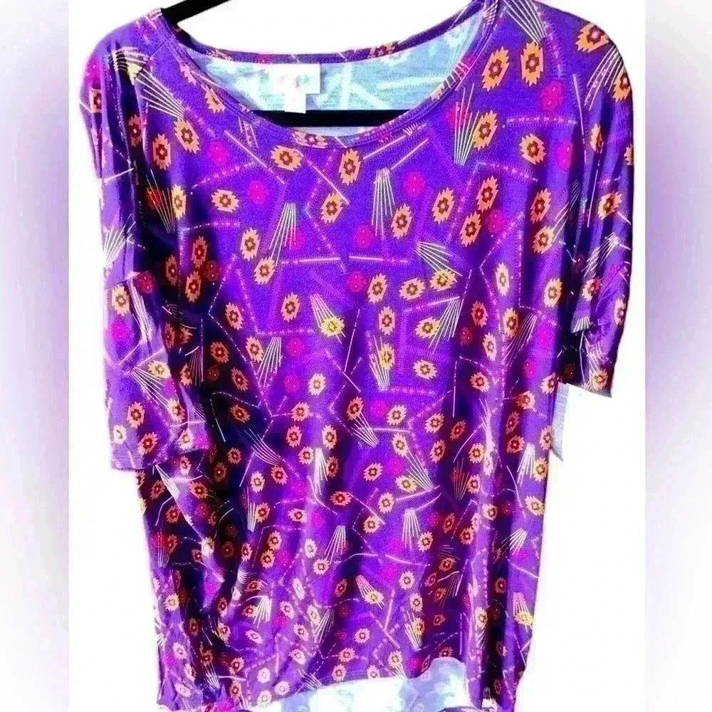 Lularoe XS Purple Irma tunic top. Aztec pattern. NWT. Silky Jersey feel.